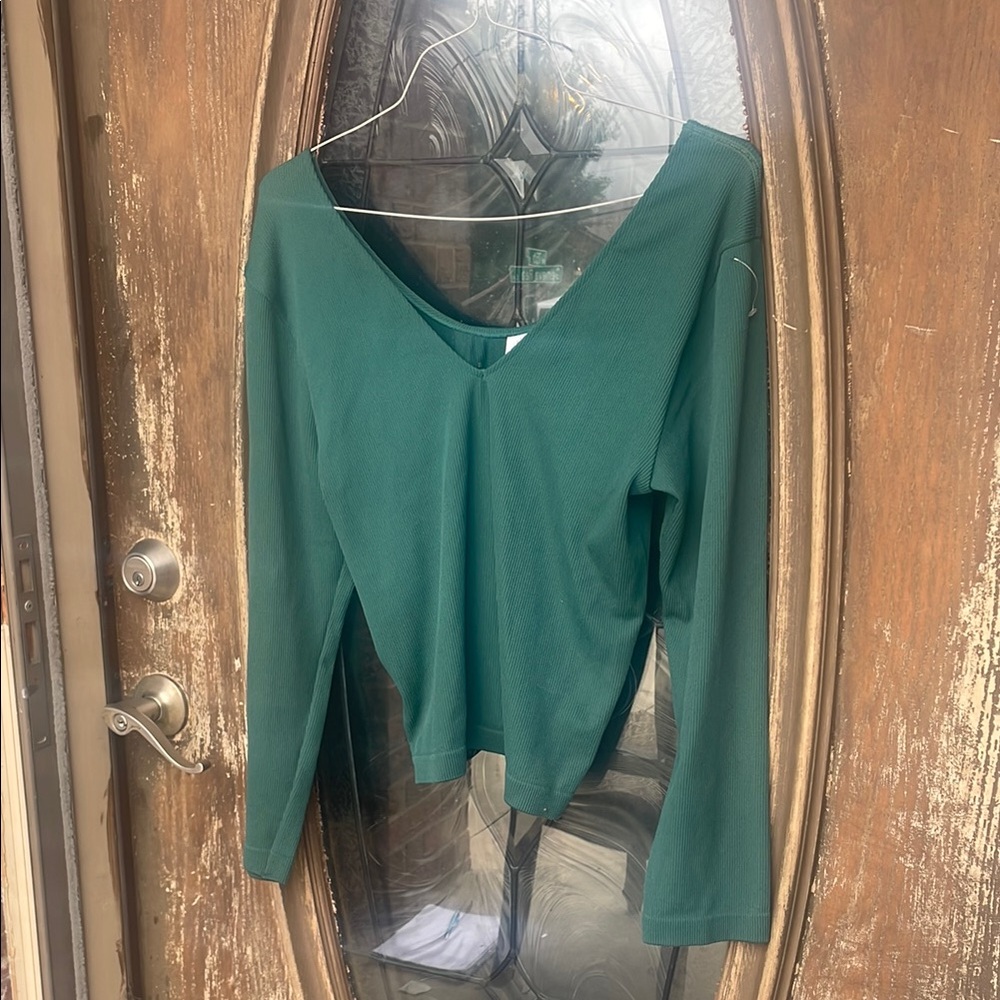 a new day spandex long sleeve green top! Size XXL